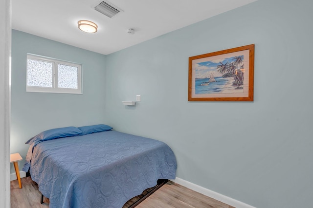 bedroom featuring light hardwood / wood-style flooring