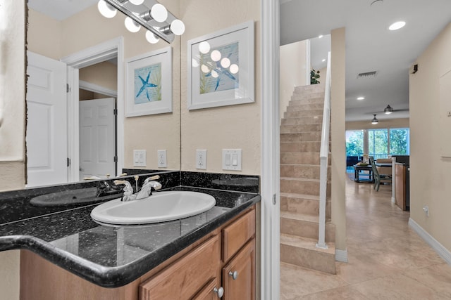 bathroom with vanity and tile patterned flooring