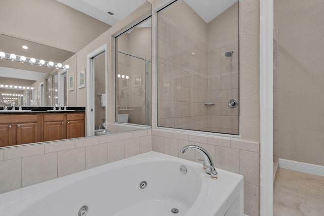 full bathroom with vanity, separate shower and tub, and toilet