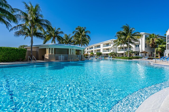 view of swimming pool featuring pool water feature