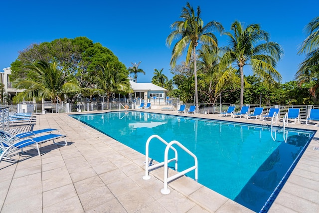 view of swimming pool featuring a patio