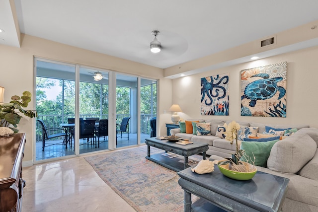 living room featuring ceiling fan