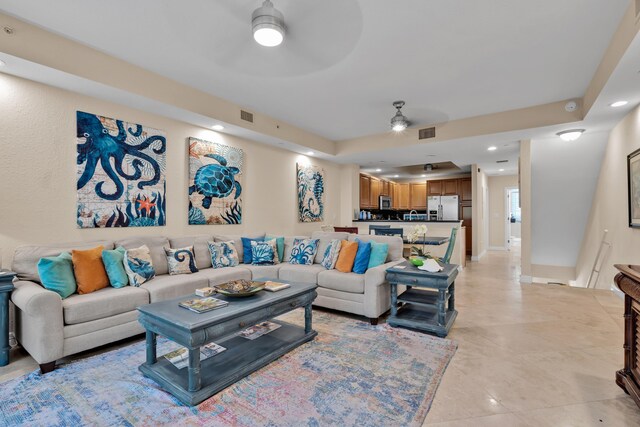 living room with ceiling fan