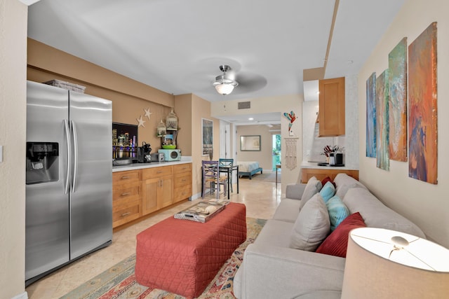 living room with ceiling fan