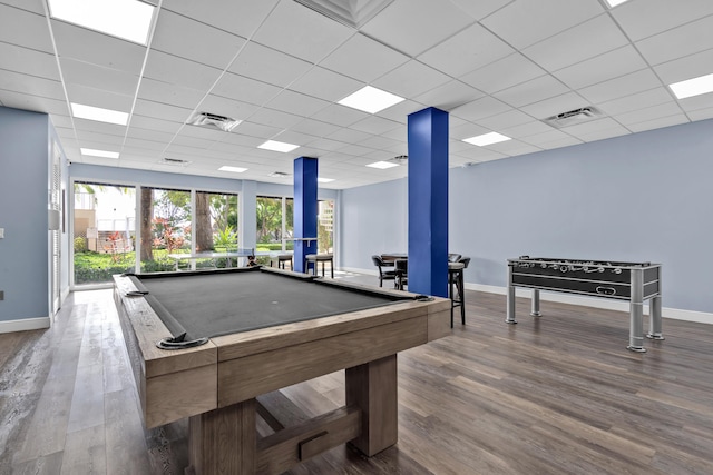 game room featuring pool table, wood-type flooring, and a paneled ceiling