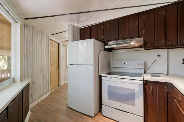 kitchen with light wood-type flooring, under cabinet range hood, white appliances, light countertops, and dark brown cabinets