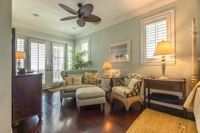 living area featuring dark wood-style floors, plenty of natural light, ornamental molding, and french doors