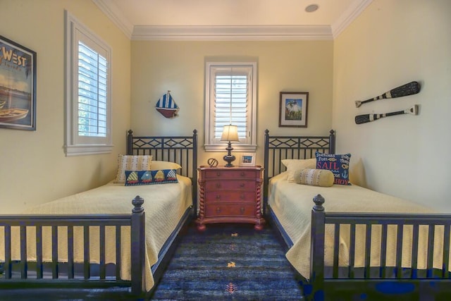 bedroom with ornamental molding