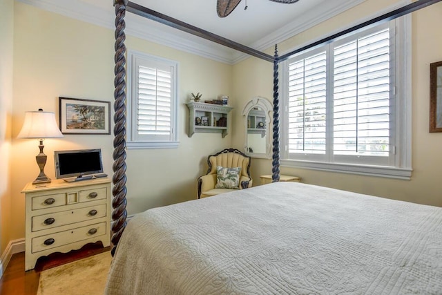 bedroom featuring crown molding and ceiling fan