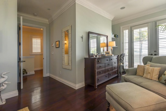 sitting room featuring baseboards, french doors, dark wood finished floors, and crown molding