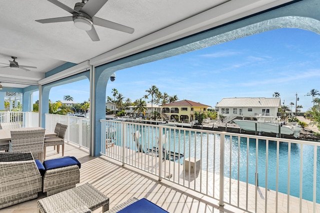 view of swimming pool with ceiling fan