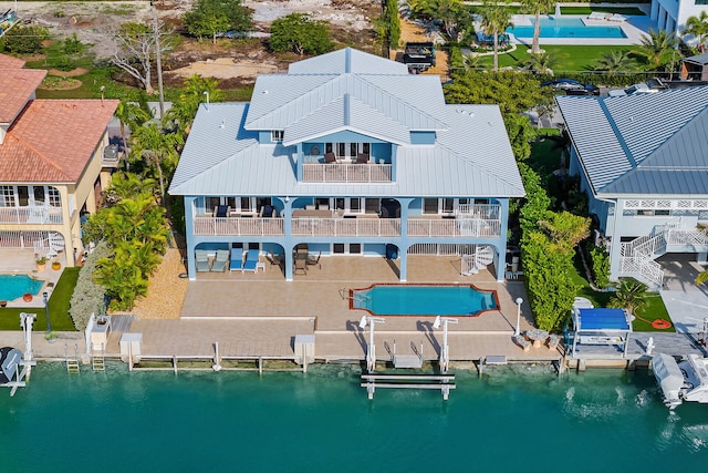 bird's eye view with a water view