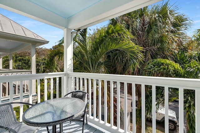 balcony featuring outdoor dining area