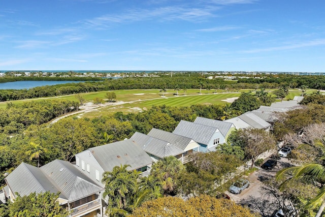 drone / aerial view featuring a water view and view of golf course