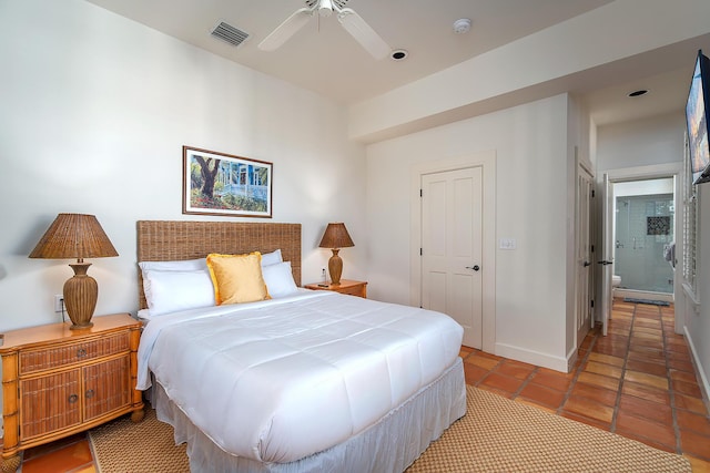 tiled bedroom with ceiling fan