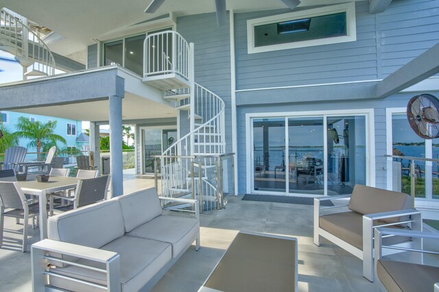 view of patio / terrace featuring a balcony and an outdoor living space