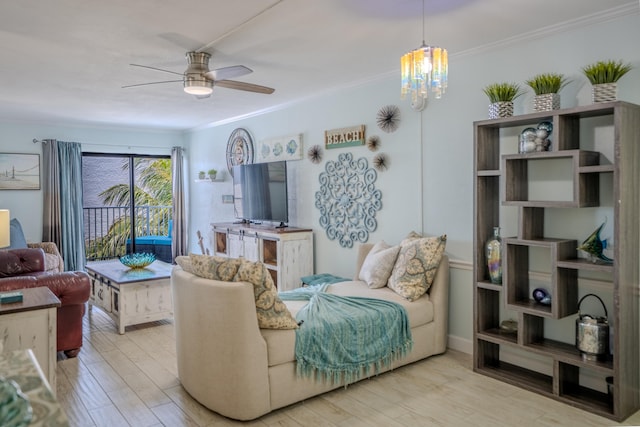 201 E Ocean Dr Unit 3-311, Key Colony, FL 33051 - living room featuring crown molding, wood finished floors, ceiling fan, and a chandelier