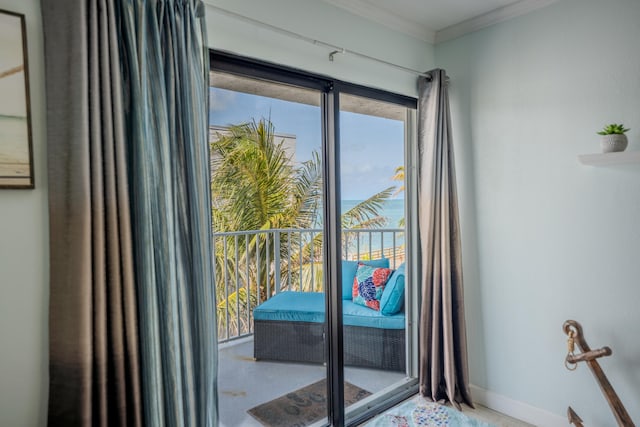 201 E Ocean Dr Unit 3-311, Key Colony, FL 33051 - doorway featuring crown molding, plenty of natural light, and baseboards