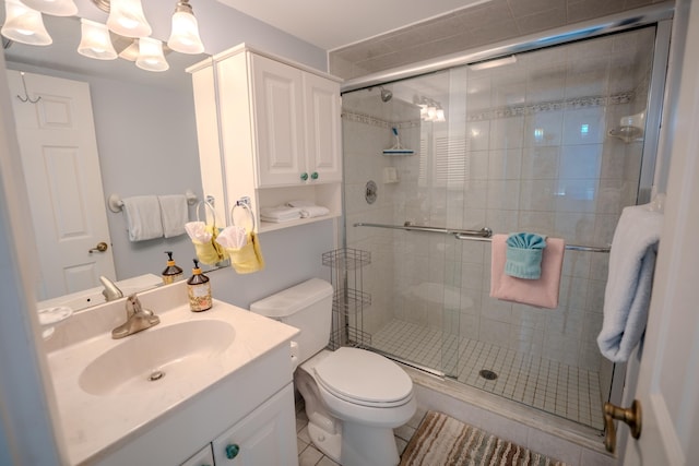 201 E Ocean Dr Unit 3-311, Key Colony, FL 33051 - full bathroom with a stall shower, toilet, and vanity