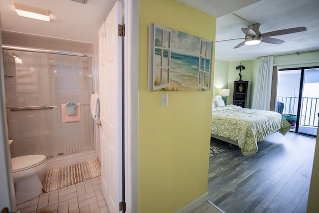 201 E Ocean Dr Unit 3-311, Key Colony, FL 33051 - bedroom with access to outside and a ceiling fan