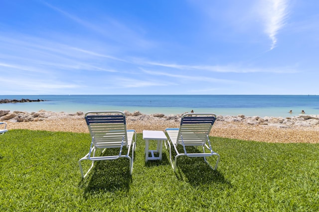 1101 W Ocean Dr Unit 29, Key Colony, FL 33051 - view of property's community with a water view and a lawn