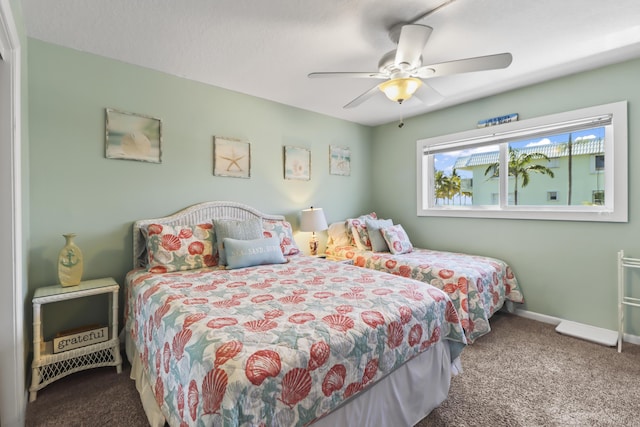 1101 W Ocean Dr Unit 29, Key Colony, FL 33051 - carpeted bedroom featuring baseboards and ceiling fan