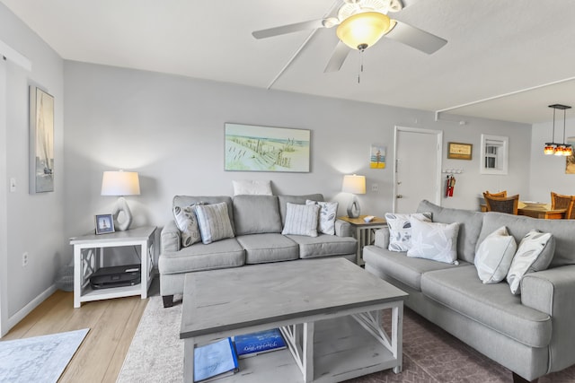 1101 W Ocean Dr Unit 29, Key Colony, FL 33051 - living room featuring wood finished floors, ceiling fan, and baseboards