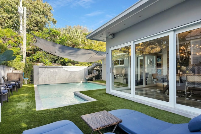 view of yard featuring an outdoor pool