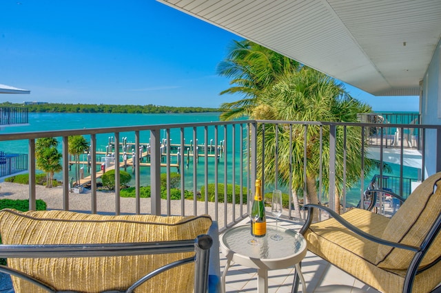 balcony featuring a water view