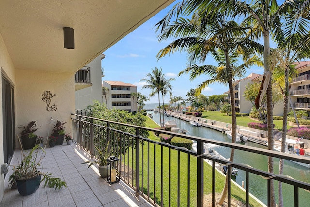 balcony featuring a water view