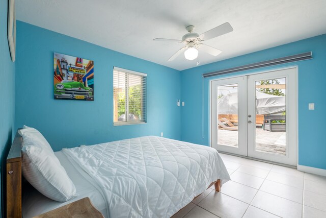 bedroom with baseboards, ceiling fan, access to exterior, french doors, and light tile patterned flooring