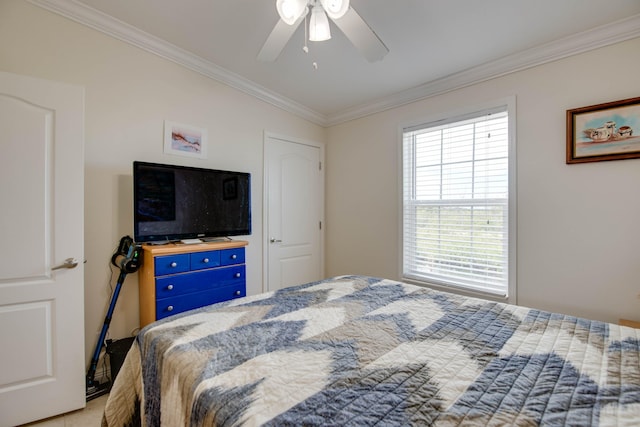 bedroom with ceiling fan and ornamental molding