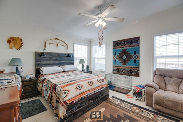 bedroom featuring ornamental molding, ceiling fan, and light tile patterned flooring