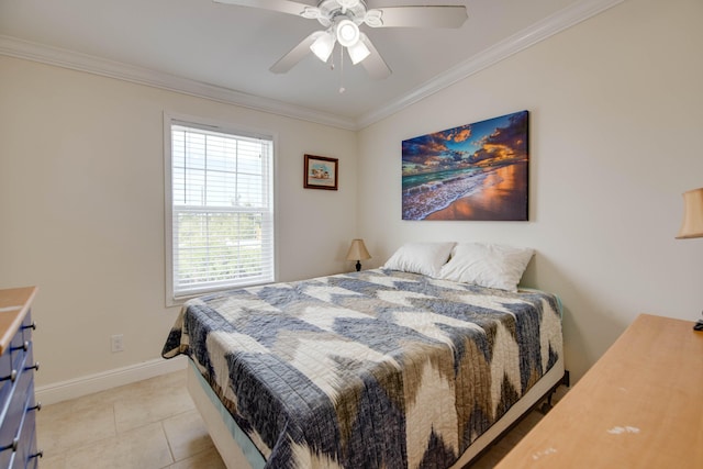 tiled bedroom with ornamental molding and ceiling fan