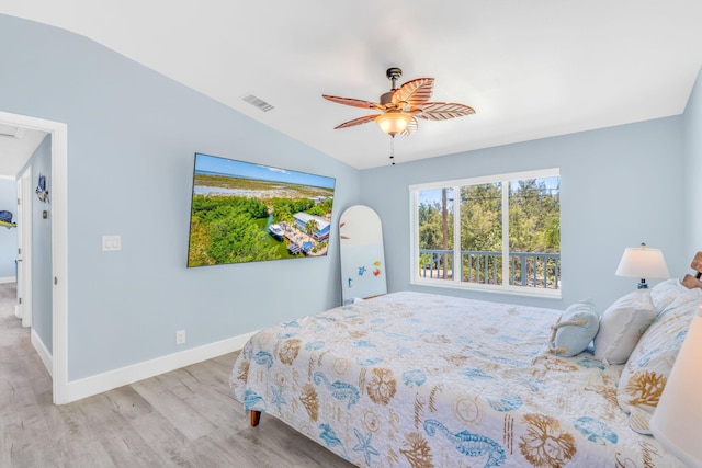 29012 Bigonia Dr, Big Pine, FL 33043 - bedroom with wood finished floors, lofted ceiling, baseboards, and a ceiling fan