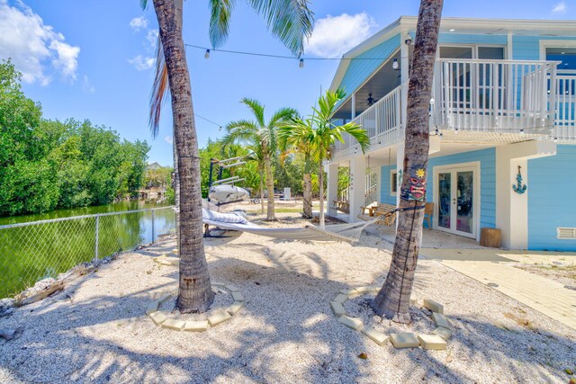 29012 Bigonia Dr, Big Pine, FL 33043 - view of yard featuring fence and a water view