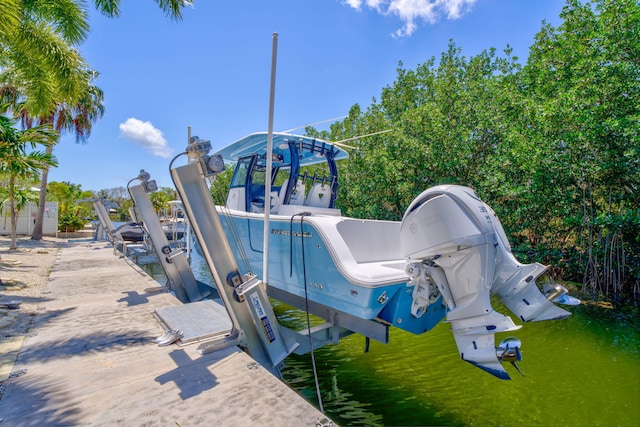 29012 Bigonia Dr, Big Pine, FL 33043 - dock area featuring boat lift