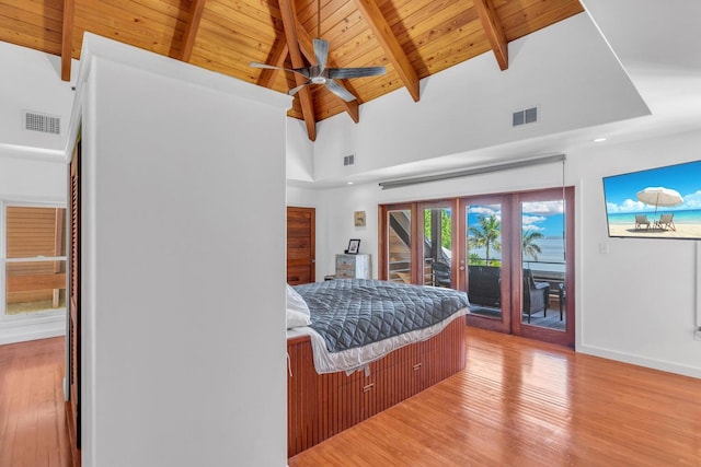 bedroom featuring beamed ceiling, wooden ceiling, hardwood / wood-style floors, and access to outside