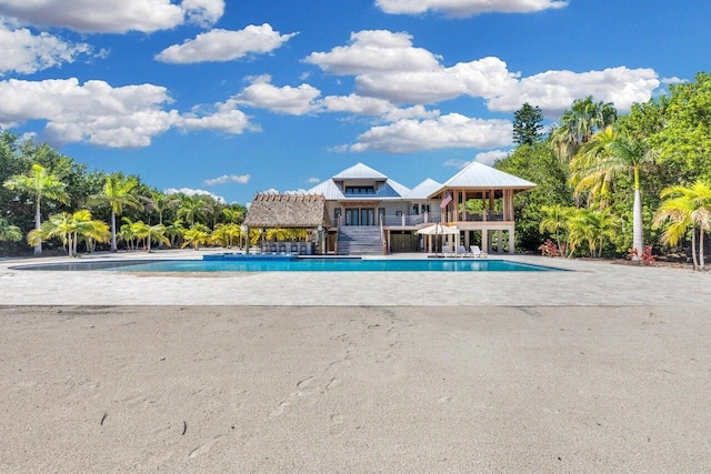 view of swimming pool featuring a gazebo and a patio area