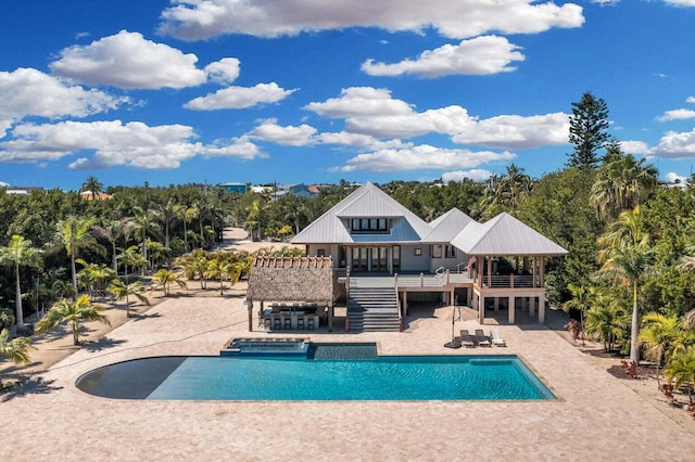 view of pool featuring a patio