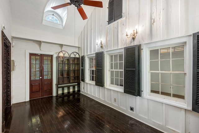 unfurnished sunroom featuring vaulted ceiling, french doors, and ceiling fan