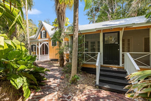 exterior space with a sunroom