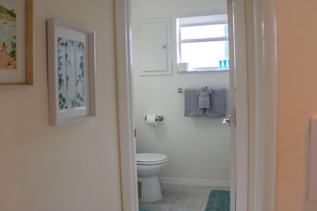 bathroom with tile patterned floors and toilet