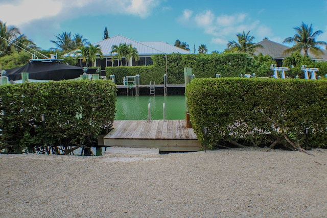 exterior space with a water view