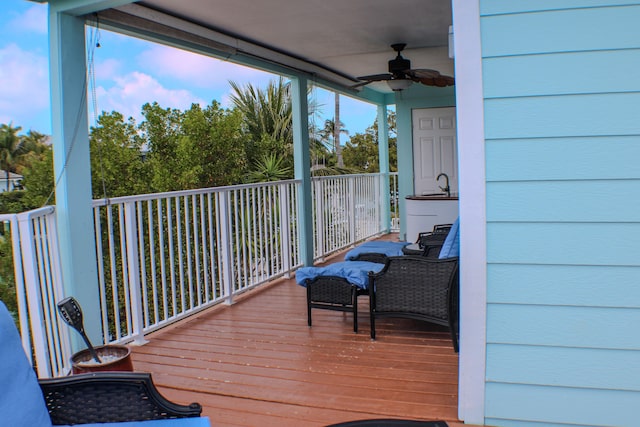 wooden terrace with ceiling fan