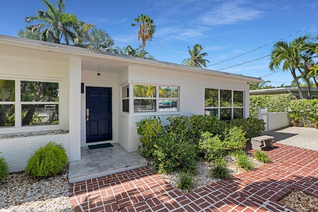 1412 Johnson St, Key West, FL 33040 - doorway to property with stucco siding