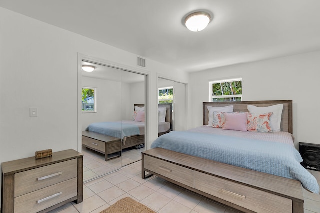 1412 Johnson St, Key West, FL 33040 - bedroom with multiple closets and light tile patterned floors