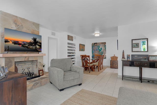 1412 Johnson St, Key West, FL 33040 - living area featuring light tile patterned flooring and a fireplace
