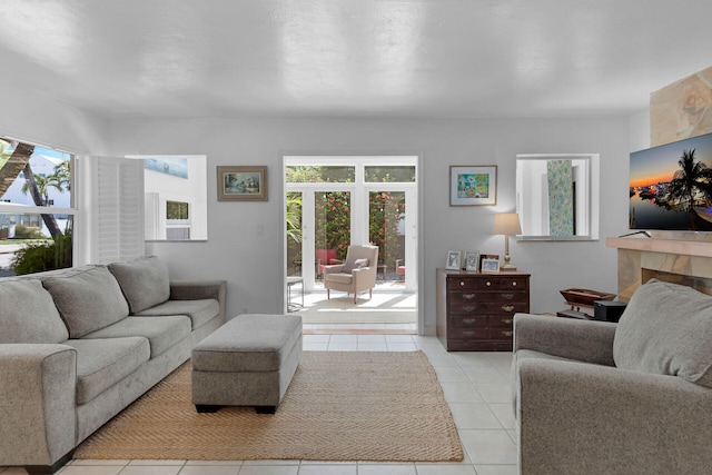 1412 Johnson St, Key West, FL 33040 - living room featuring light tile patterned flooring and healthy amount of natural light