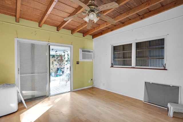 interior space featuring beamed ceiling, wooden ceiling, ceiling fan, and wood finished floors